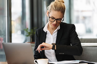 female solicitor looking at watch