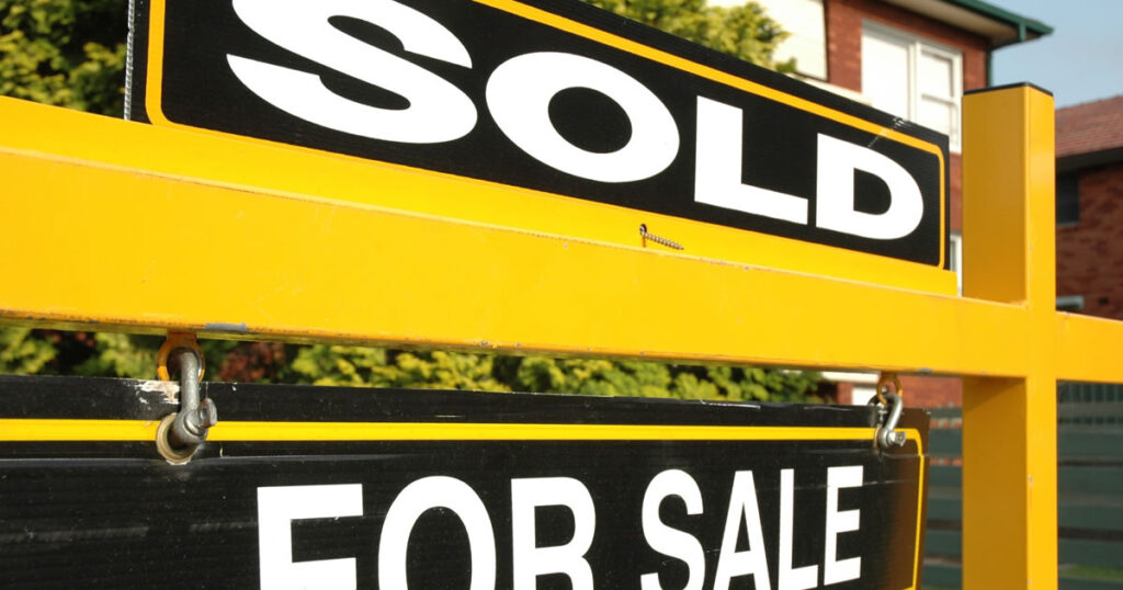 For Sale / Sold sign outside residential property