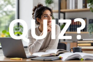 Aspiring solicitor studying for the Solicitors Qualifying Examination (SQE) with legal textbooks and a laptop while preparing for a legal career in the UK.